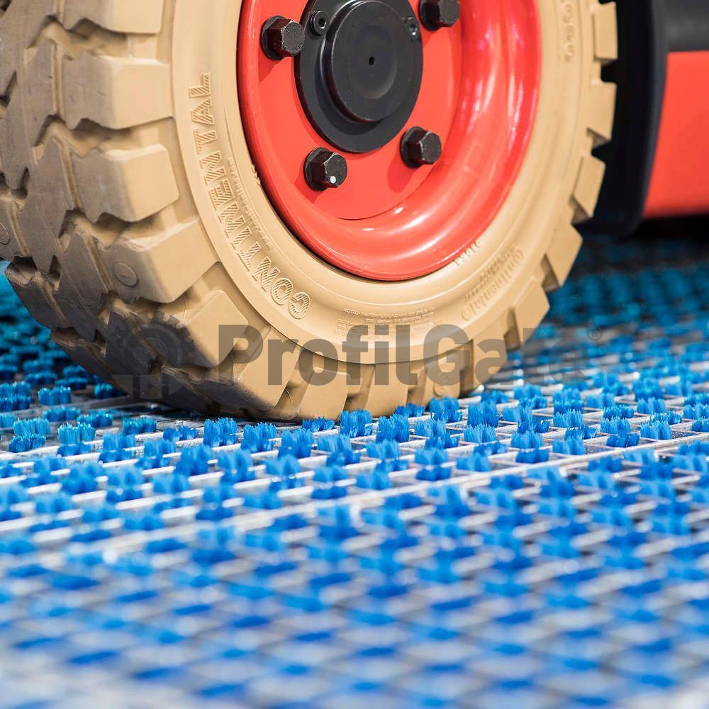 ProfilGate mat removing dirt from white tyre